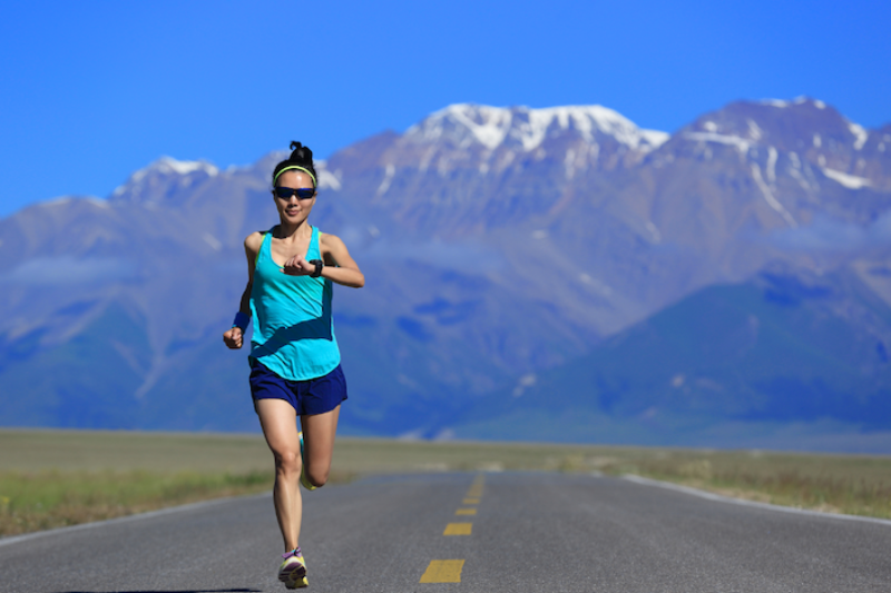 Active woman running outdoors, representing the energy and vitality supported by 3rd Element Nutrition supplements.